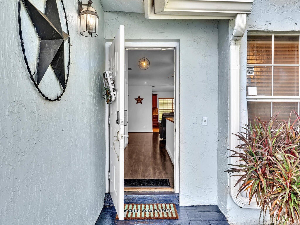 Photo of 5420 PINE Circle, Coral Springs, FL 33067 (MLS # B26080038)