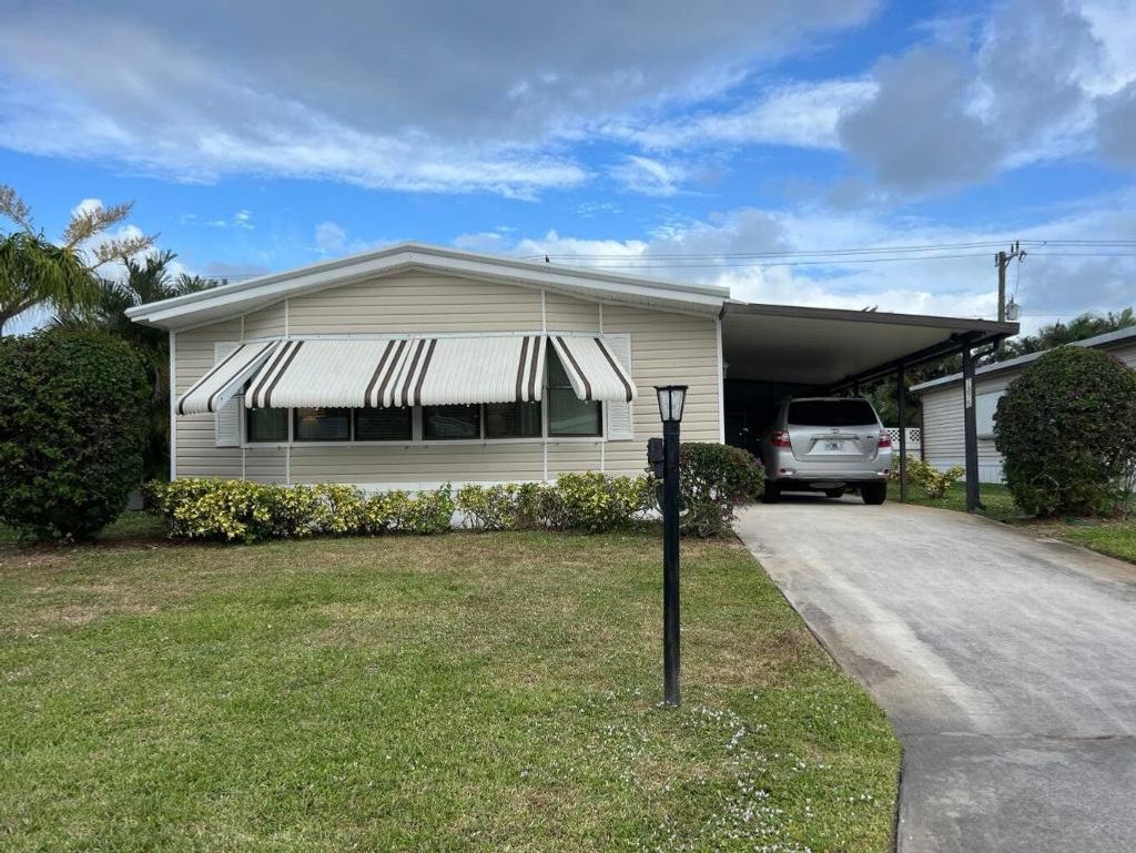 Photo of 7375 SE Independence Avenue, Hobe Sound, FL 33455 (MLS # R11154509)