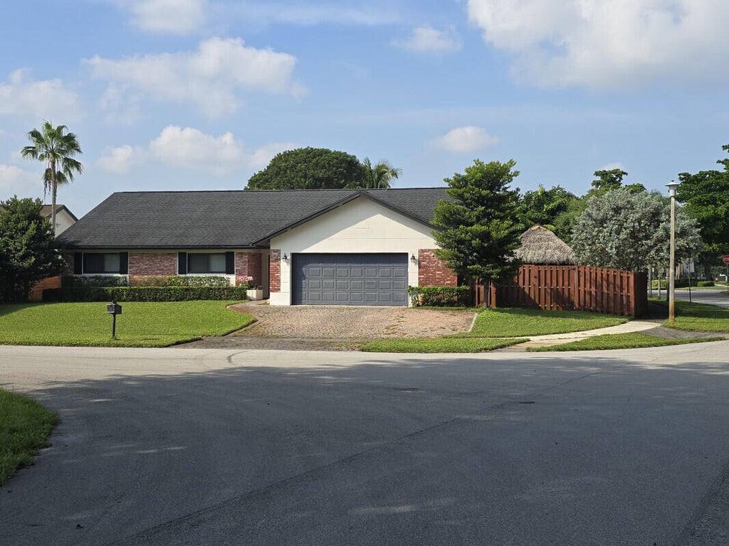 Photo of 1630 NW 118th Terrace, Pembroke Pines, FL 33026 (MLS # B26087136)