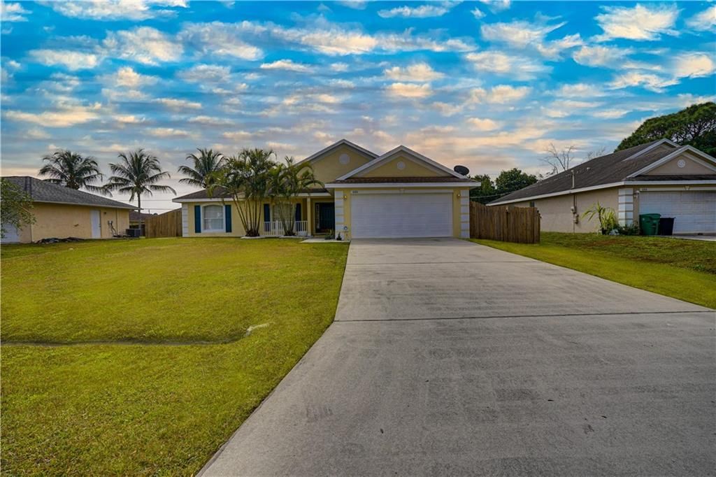 Photo of 1080 SW Alcantarra Blvd, Port Saint Lucie, FL 34953 (MLS # F10317291)
