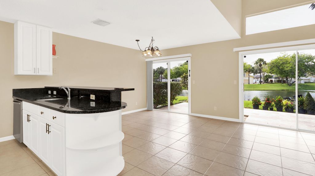 Photo of 12843 Woodmill Drive, Palm Beach Gardens, FL 33418 (MLS # R11019267)