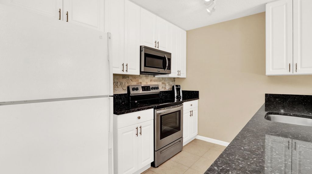 Photo of 12843 Woodmill Drive, Palm Beach Gardens, FL 33418 (MLS # R11019267)