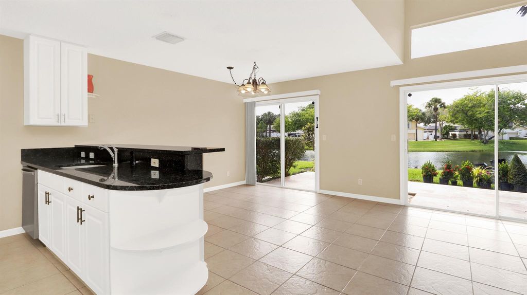 Photo of 12843 Woodmill Drive, Palm Beach Gardens, FL 33418 (MLS # R11019267)