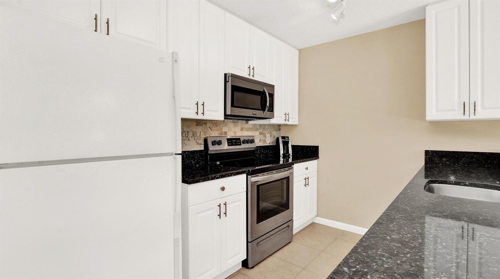 Photo of 12843 Woodmill Drive, Palm Beach Gardens, FL 33418 (MLS # R11019267)