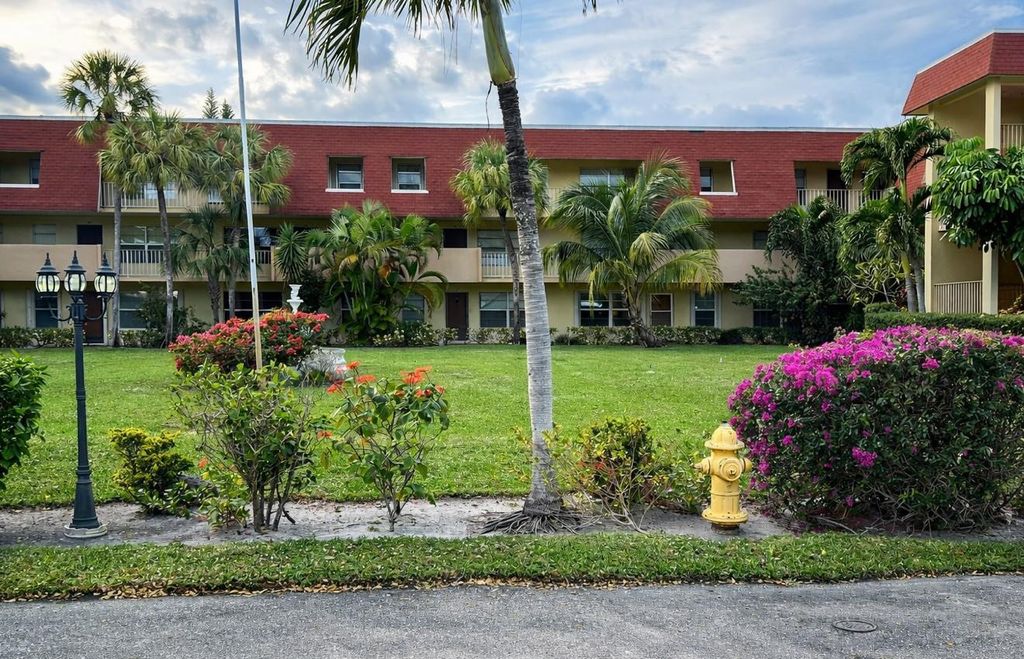 Photo of 3081 NW 47th Terrace #107, Lauderdale Lakes, FL 33313 (MLS # F10555408)