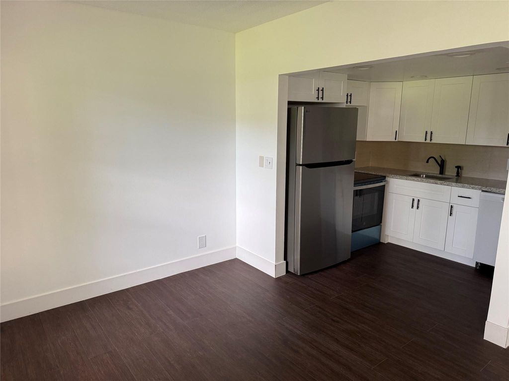 Photo of 3081 NW 47th Terrace #107, Lauderdale Lakes, FL 33313 (MLS # F10555408)