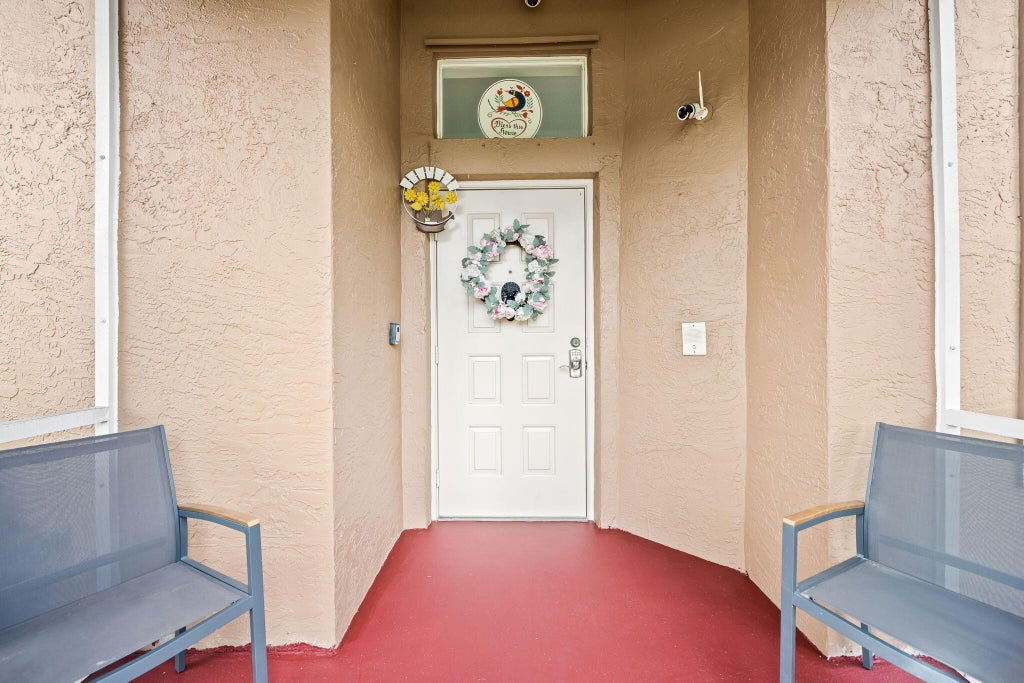 Photo of 10156 Lombardy Drive, Tamarac, FL 33321 (MLS # B26053228)
