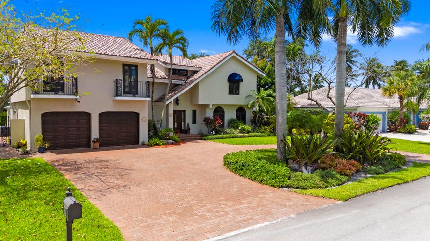 THIS HOUSE CHECKS A LOT OF BOXES! 5 BEDS, 5.5 BATHS, JUST UNDER 4,000 LA SQ FT. IMPACT WINDOWS AND DOORS. 2006 ROOF, CIRCULAR DRIVEWAY FOR 8 CARS + 2-CAR GARAGE. 4 NEWER A/C UNITS, 80GL WATER HEATER. UPDATED ELECTRICAL PANEL. RECENTLY REMODELED KITCHEN W/ GRANITE COUNTERS, WOOD CABINETS AND SS APPLIANCES. 1 BEDROOM 1.5 BATH DOWNSTAIRS. THE OVERSIZED PRIMARY ROOM IS UPSTAIRS. IT INCLUDES TWO SEPARATE HIS-AND-HER BATHROOMS W/ FRAMELESS GLASS SHOWERS/GRANITE COUNTERS. IT ALSO HAS A LARGE BALCONY OVERLOOKING THE POOL AND LAKE. ADDITIONAL FEATURES INCLUDE UPDATED POOL W/ TRAVERTINE MARBLE DECK PAVERS, PRIVATE DOCK, A COZY CONVERSATION LOUNGE W/ FIREPLACE, OUTDOOR PERGOLA, FULLY FENCED YARD AND SOUTH-FACING BACKYARD/POOL AREA. PROFESSIONALLY LANDSCAPED. SPRINKLER WATER COMES FROM THE LAKE.