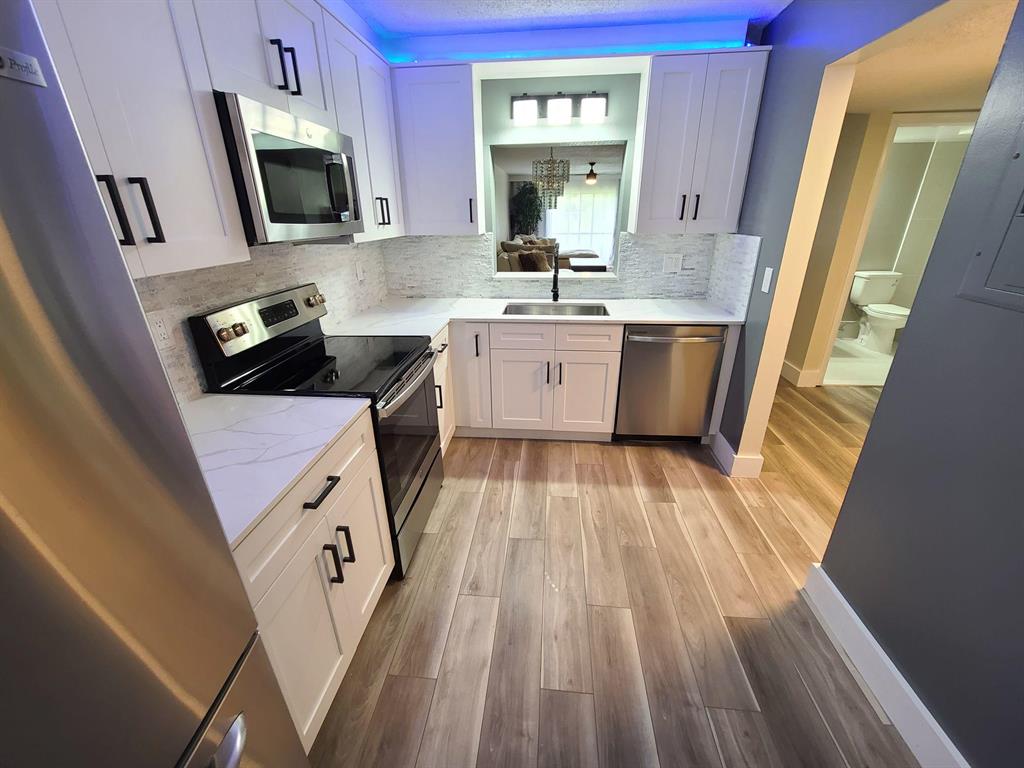 Photo of 2975 SW 22nd Avenue Ave #105, Delray Beach, FL 33445 (MLS # R10733392)