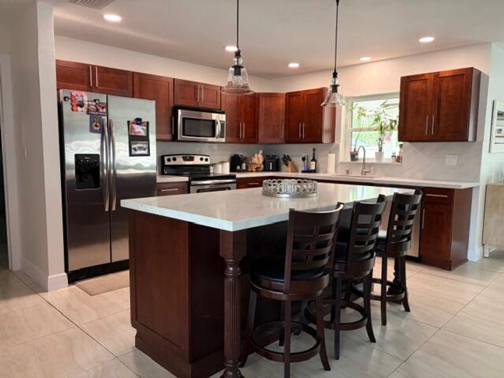 Photo of 5821 SW 13th Street, Plantation, FL 33317 (MLS # B26026289)