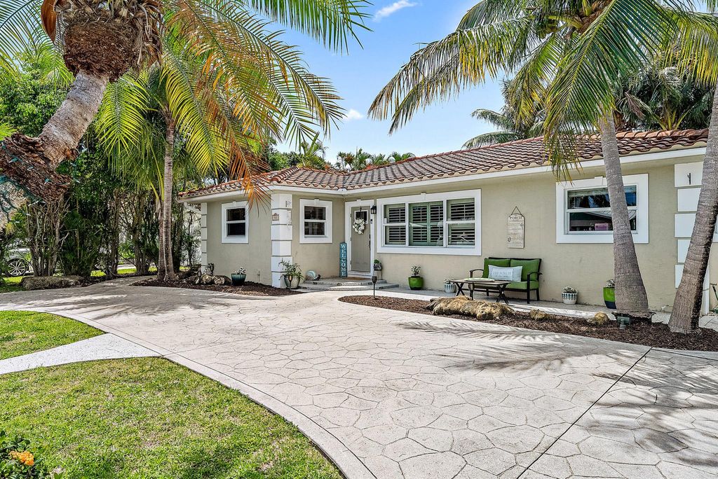 Photo of 312 Claremont Lane, Palm Beach Shores, FL 33404 (MLS # R10888832)