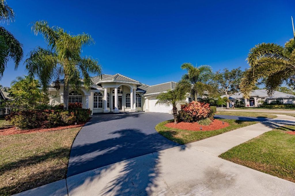 Photo of 113 Sugarwood Crescent, Royal Palm Beach, FL 33411 (MLS # R11148830)