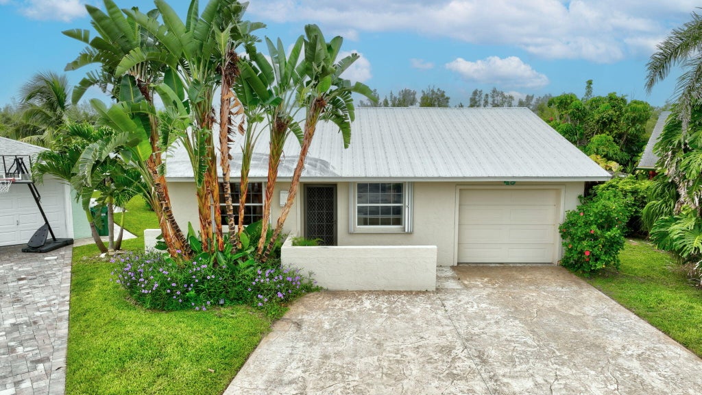 Photo of 49 Aqua Ra Drive, Jensen Beach, FL 34957 (MLS # R11003921)