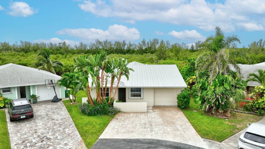 Photo of 49 Aqua Ra Drive, Jensen Beach, FL 34957 (MLS # R11003921)