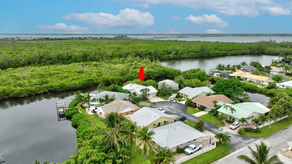 Photo of 49 Aqua Ra Drive, Jensen Beach, FL 34957 (MLS # R11003921)