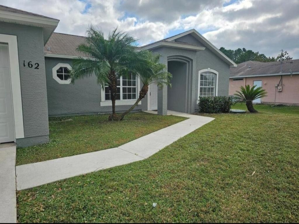 Photo of 162 SW Grimaldo Terrace, Port Saint Lucie, FL 34984 (MLS # R11154351)