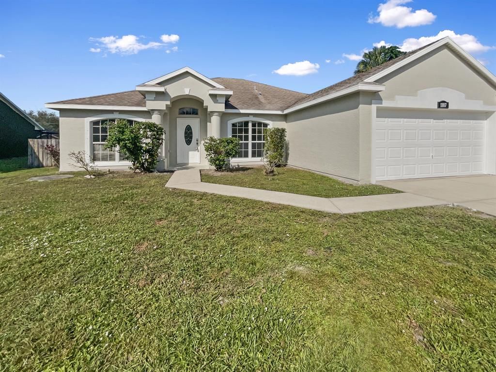 Photo of 1107 SW Colorado Avenue, Port St Lucie, FL 34953 (MLS # R10841953)