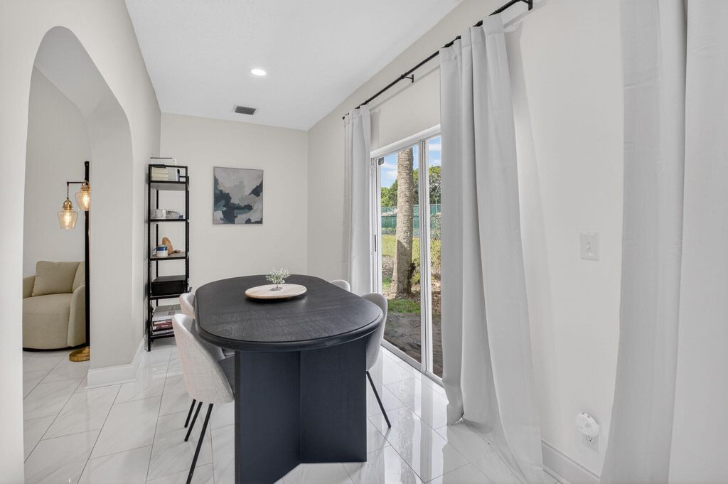 Photo of 5111 Sabal Gardens Lane #4, Boca Raton, FL 33487 (MLS # B26025553)