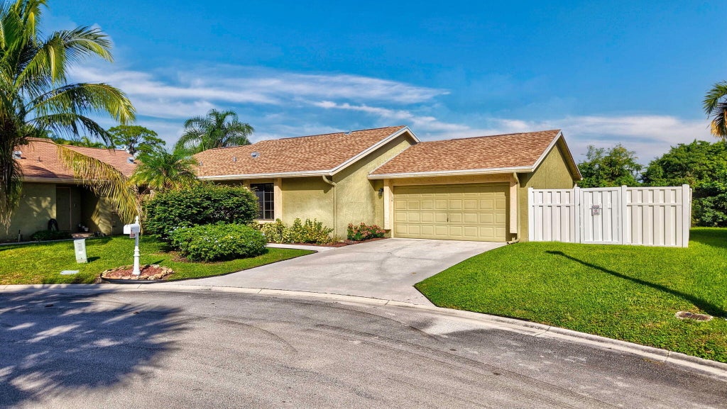 Photo of 9528 PALISADES PARK Road, Boca Raton, FL 33428 (MLS # B26091150)