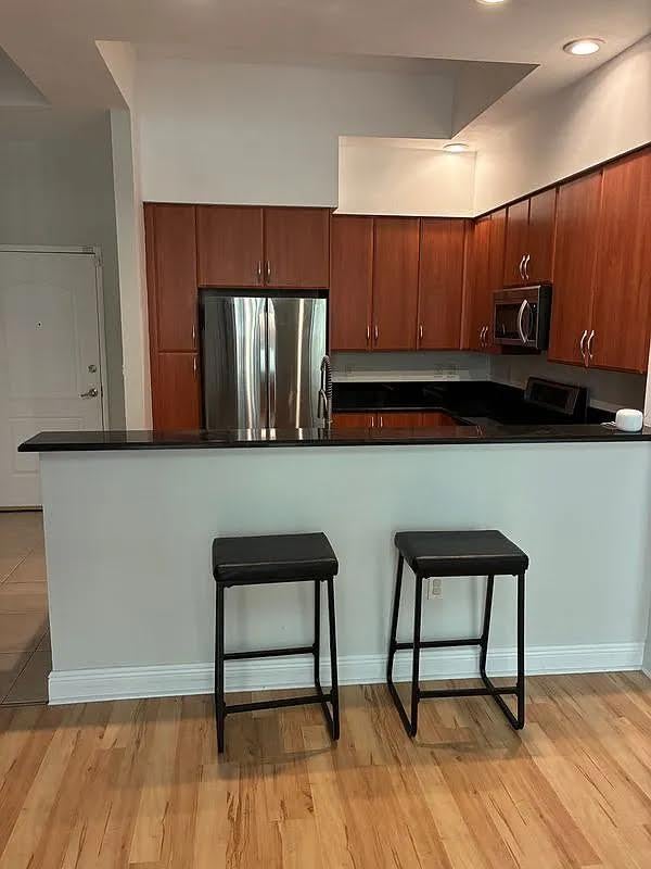 Photo of 801 S OLIVE Avenue #437, West Palm Beach, FL 33401 (MLS # B26081279)