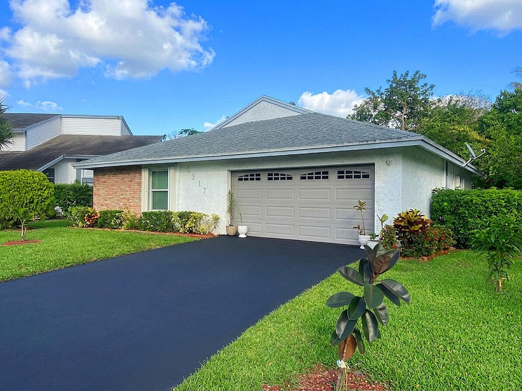 Photo of 3517 NW 73rd Way NW, Coral Springs, FL 33065 (MLS # B26015630)