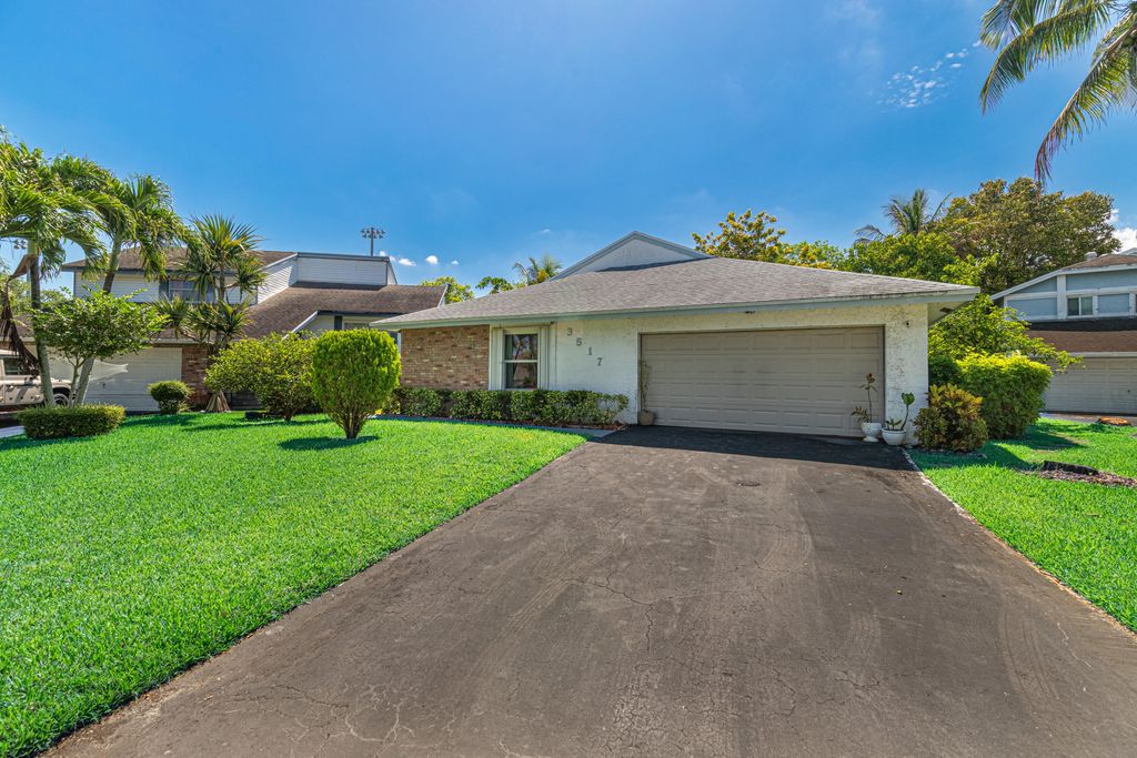 Photo of 3517 NW 73rd Way NW, Coral Springs, FL 33065 (MLS # B26015630)