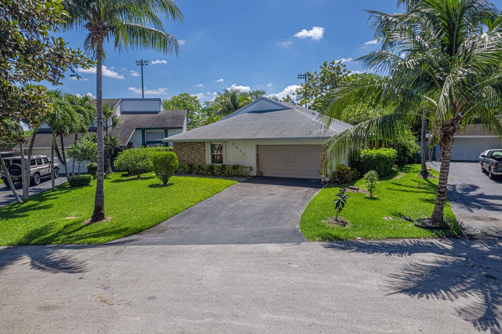 Photo of 3517 NW 73rd Way NW, Coral Springs, FL 33065 (MLS # B26015630)