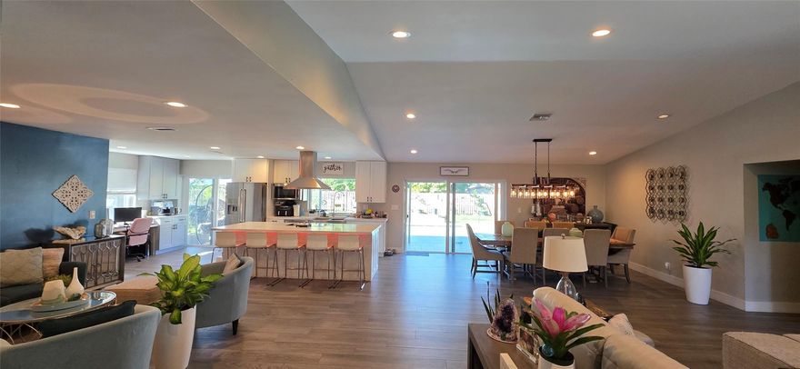 No HOA - Stunning Turn-Key 3/2 home designed for modern living and effortless entertaining. The bright open-concept floor plan offers a spacious family room, vaulted ceilings, recessed lighting, and abundant natural light, complemented by contemporary materials, neutral colors, porcelain tile throughout, quartz countertops, custom closets, and thoughtfully selected finishes. Enjoy peace of mind with newly installed impact windows (2025) and ambiance from recessed dimmable lighting in the main living spaces. The fully fenced 0.31-acre lot delivers exceptional outdoor living with a saltwater pool and an oversized covered patio—perfect for entertaining and relaxing. Concrete tile Roof 2000, 9 yrs of life remaining. The A/C is-2015- Tankless water heater from-2018 Conveniently located near Whispering Oaks Park, with easy access to Atlantic Blvd and University Dr. The seller has maintained the property in excellent condition, with quality upgrades and attention to detail throughout.