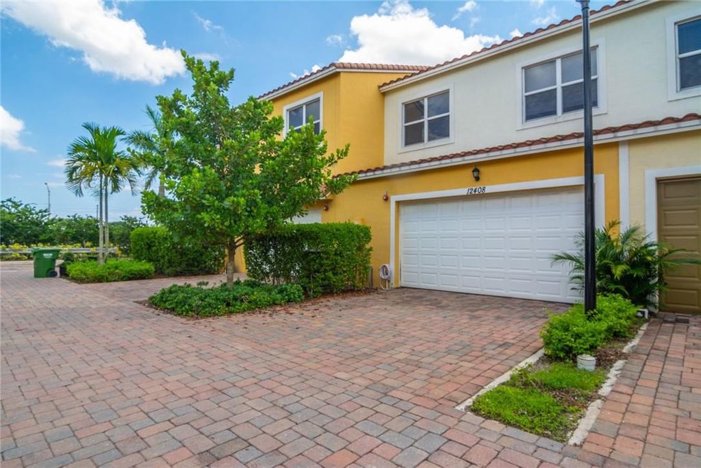 Photo of 12408 NW 17ct, Pembroke Pines, FL 33028 (MLS # F10552470)