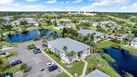 Photo of 1529 SE Royal Green Circle #102, Port Saint Lucie, FL 34952 (MLS # B26090965)