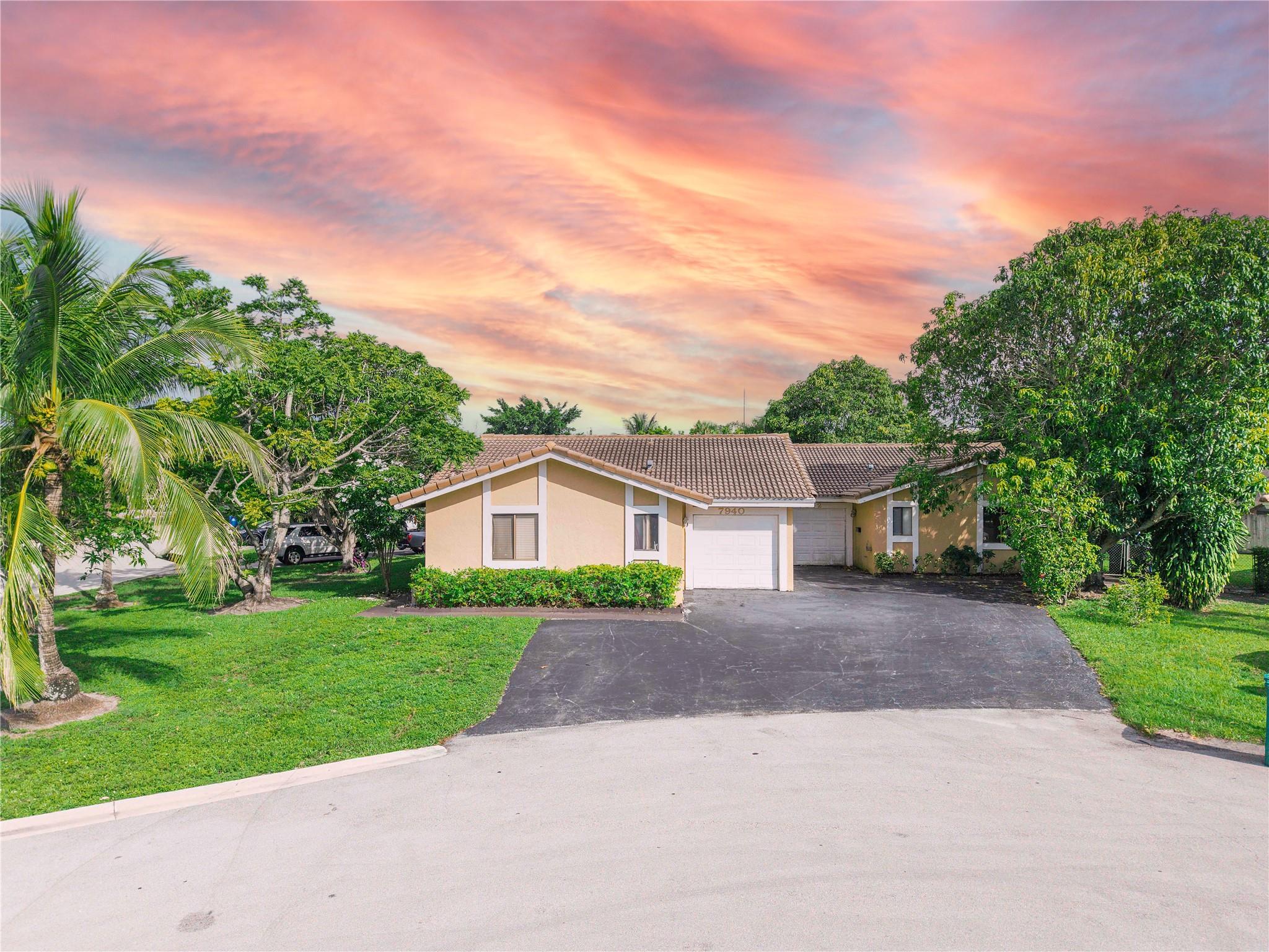 Rarely available duplex in the heart of Coral Springs featuring two spacious 2 bed/2 bath units, each with a 1-car garage, and its own separate water and electrical meters. Both units offer updated kitchens and baths. Property sits on an oversized lot with a huge fenced yard and extended driveway providing ample parking. One side is leased at $2,500/month with tenant responsible for all utilities, maximizing cash flow. No HOA and strong rental demand make this a solid investment or excellent option for an owner-occupant. Conveniently located near schools, shopping, and dining.