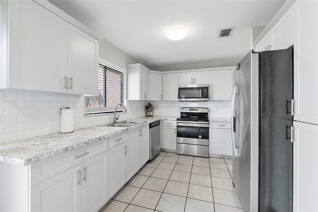 Photo of 7940 NW 37th Drive, Coral Springs, FL 33065 (MLS # F10524031)