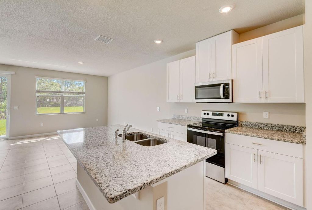 Photo of 5720 SE Edgewater Circle, Stuart, FL 34997 (MLS # R10985580)