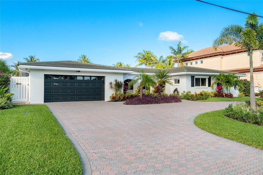 This is it! The perfect spot on the North Grand Canal in the "panhandle" of Lighthouse Point. This spacious home is located on a private island street in the heart of Lighthouse Point's Venetian Isles! Situated on a 10,800 SF lot with 90' of waterfront, on extra wide canal that leads directly to the intracoastal! Features 3 bedrooms/3 bathrooms with lots of living space that can easily be reconfigured to give that open concept living! Roof is 2017, seawall and dock 2015, 25KW generator w/ 500 gallon propane tank, H20 heater 2019, 2 zones of A/C replaced in 2021, white PVC fence surrounds the property. Straight boat ride down the deepwater North Grand canal and out the inlet to the ocean in minutes! A boaters paradise not to be missed! Tenant occupied until 1/13/2023 paying $6500/month.