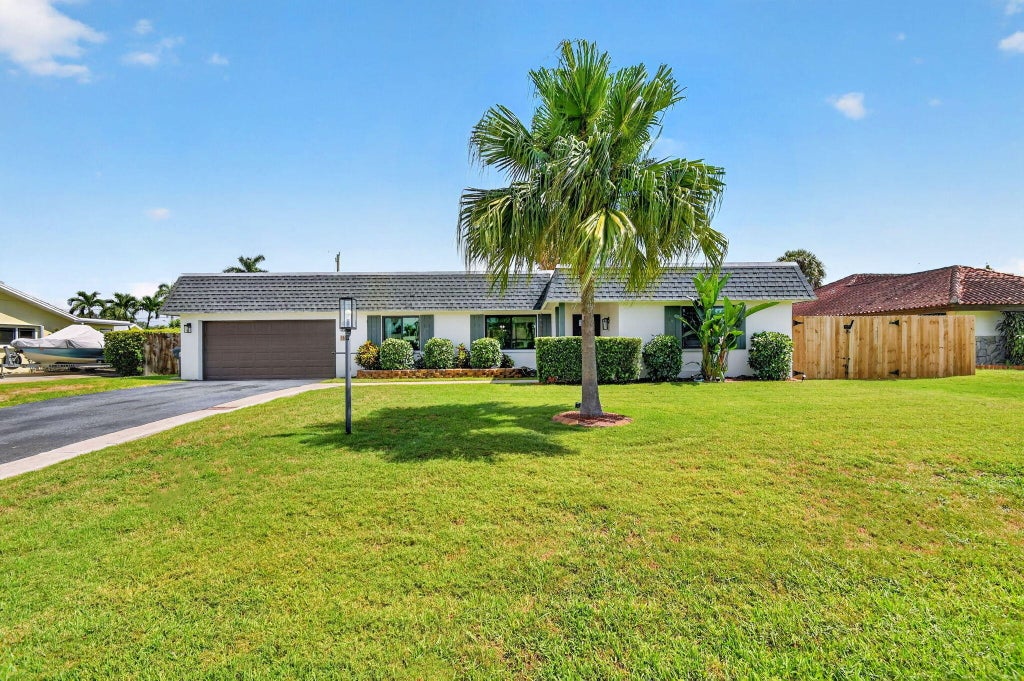 Photo of 110 W Coconut Drive, Lake Worth, FL 33467 (MLS # B26045615)
