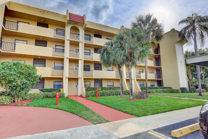 ALL AGES WELCOME! Very affordable, move-in ready 1st floor condo priced to SELL! Freshly painted, clean and spacious with split bedrooms. Very private, finished patio overlooks a a beautiful green space and is just steps from the pool. This home comes partially furnished with attractive furniture, 2 Sony flat screen TVs, collectible porcelains, dishes, and more for an amazing  value! Washer/Dryer on patio AND a separate storage closet PLUS additional storage locker. Covered carport parking space #4 plus lots of guest parking. The LOW monthly Condo Fee includes water, basic cable + HBO, building insurance,roof & exterior maintenance, pools & spa, tennis, clubhouse w/theater & fitness. SORRY: No pets or rentals permitted. MINIMUM credit score of 700 required by Association.