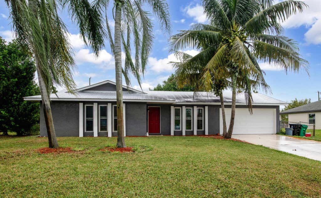 Photo of 2164 SW Cameo Boulevard, Port St Lucie, FL 34953 (MLS # R10925964)