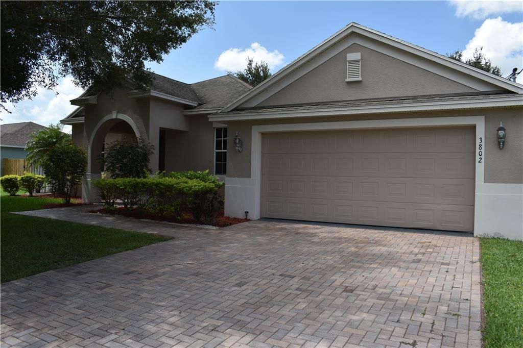 Photo of 3802 SW Lafleur St, Port Saint Lucie, FL 34953 (MLS # F10299851)