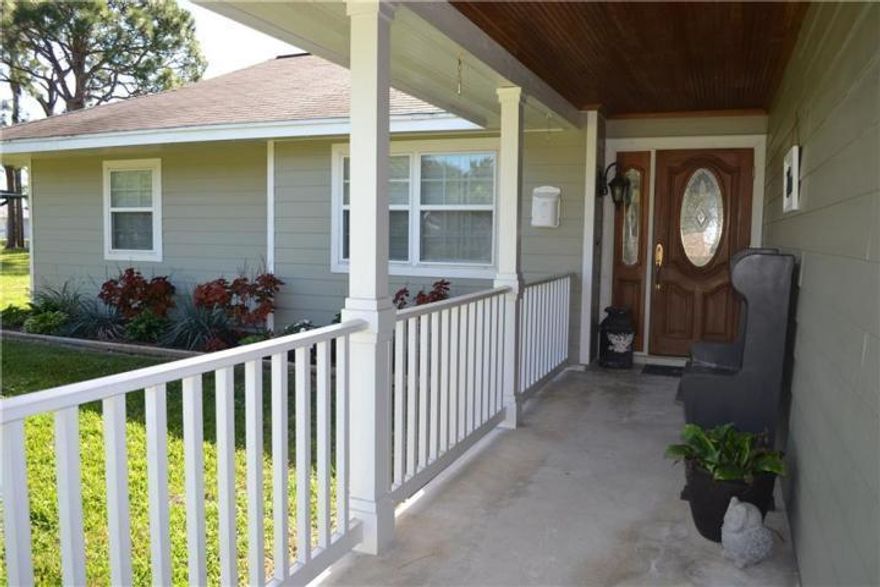 This beautiful home was remodeled in 2019 w/ dark wood laminate/sound proof flooring. New kitchen cabinets installed w/ soft touch close doors and drawers, new deep farmers sink, gorgeous granite counter tops, new dishwasher and new microwave. Family room has a working fireplace with floor to ceiling adjustable bookshelves along either side. FR has ample storage closets for your games, decorations, and seasonal clothing. Master bath has new flooring, new double sinks & vanity w/ granite counter top and framed wall mirror. Guest bathroom has new flooring, new tile shower and new vanity in 2018. Room for a pool if desired. Ruud 4 ton AC and air handler installed in 2017. Areca Palms were planted along chain link.