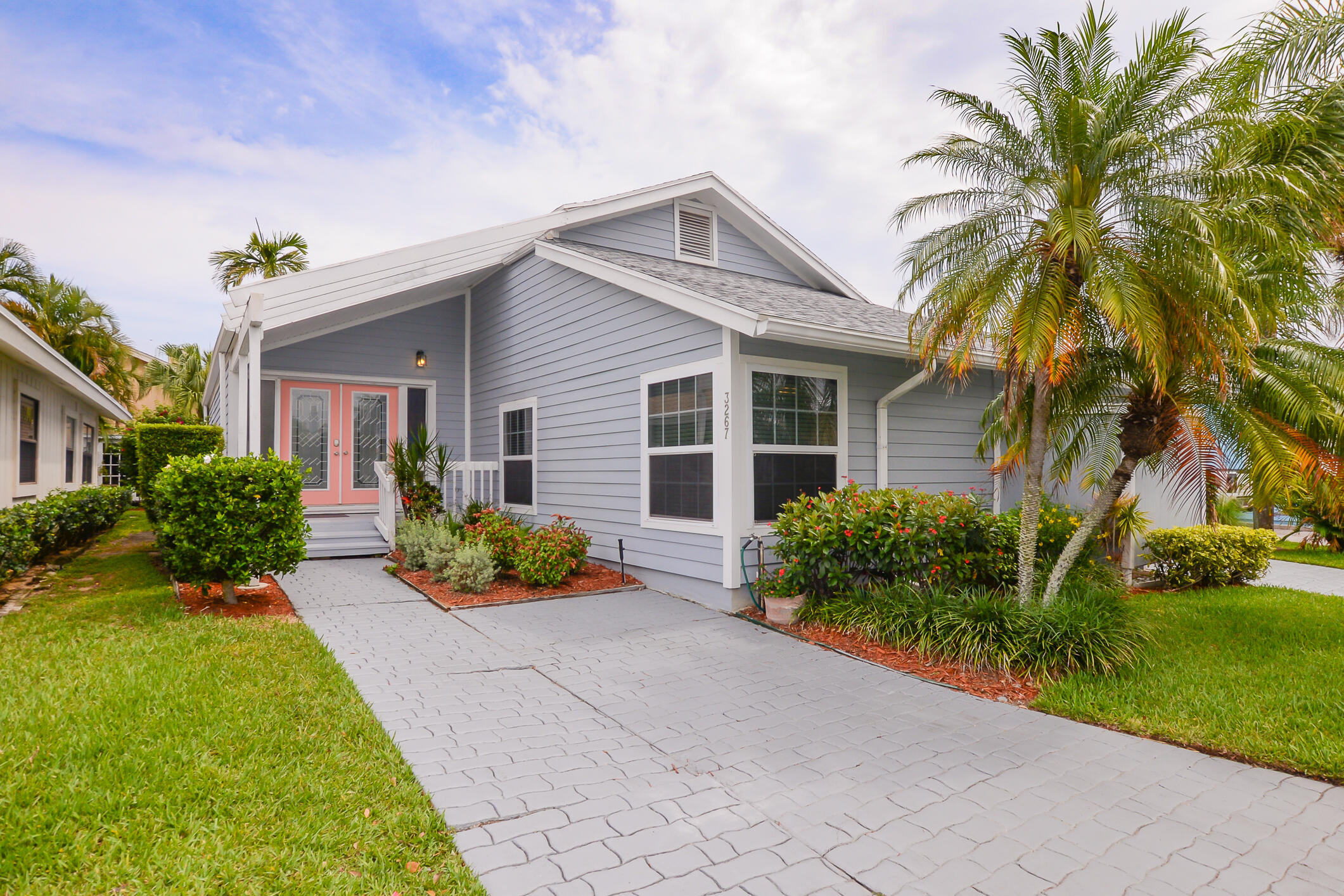 This stunning key west style 3/2 beach house is the perfect way to spend your Florida vacation. Located in a hidden gem community, the house is beautifully accented with light furniture, a private patio and many other amenities that plant you 3/4 mile from the beach! Stocked with just about everything you'll need, this house is just minutes from the beautiful Jensen beaches and downtown. Enjoy your Florida beach vacation to the fullest and book with us today. Join us in paradise. RATES: Off-Season: $4300; Mid-Season: $6500; Season: $8,500. Additional taxes and Move-in Fees apply.