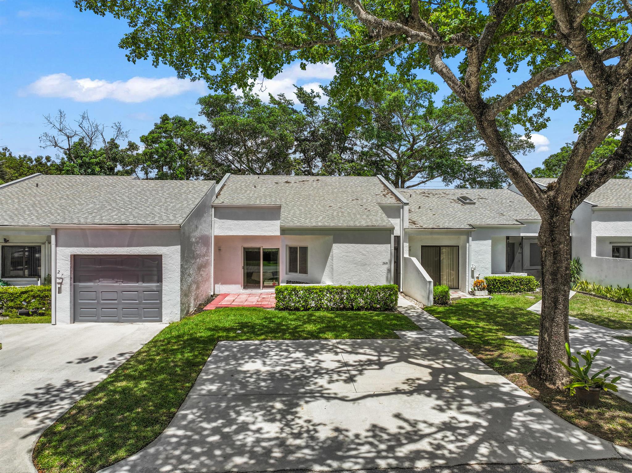 This 3BR/2BA villa in Lantern Walk is ready for its next chapter - and yours! Freshly painted and move-in ready, it features hurricane-impact windows, a 2021 A/C under full warranty, and a roof from 2016 that's covered by the HOA. Enjoy the flexibility of a bonus room - ideal as a home office, gym, or guest space. You'll also love having 2 assigned parking spots outside your front door and convenient guest parking close by. Lantern Walk is a peaceful, all-ages community with no assessments, strong reserves, and an HOA that covers lawn care, pest control, and basic cable and roof.📍 Close to shopping, dining, and everything you need. 💥 Motivated sellers - bring your offer! Sellers are open to contributing toward your closing costs or rate buydown with the right offer