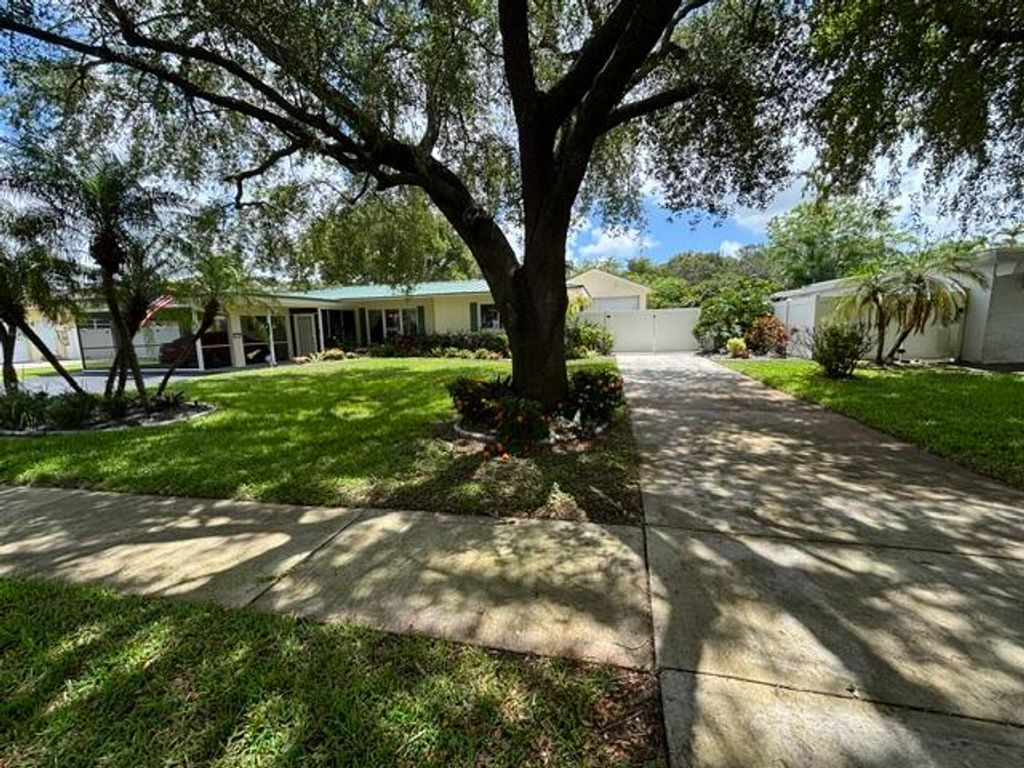 Photo of 660 Azalea Court, Plantation, FL 33317 (MLS # B26033403)