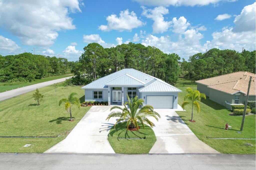 Photo of 5745 NW Wesley Road, Port Saint Lucie, FL 34986 (MLS # R11117693)