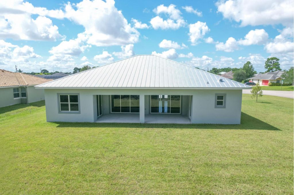 Photo of 5745 NW Wesley Road, Port Saint Lucie, FL 34986 (MLS # R11117693)