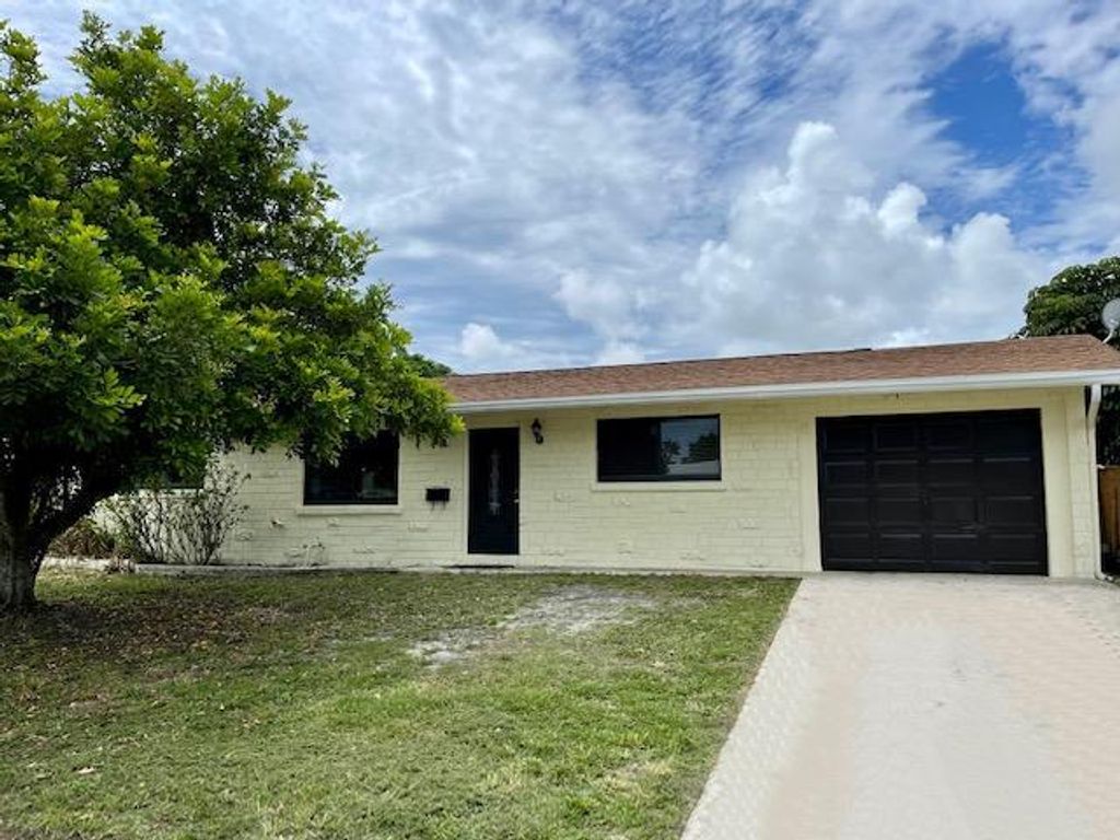 Photo of 3374 Florida Boulevard, Palm Beach Gardens, FL 33410 (MLS # R10729009)