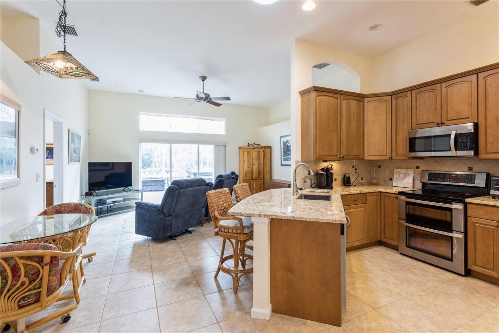 Photo of 8121 SW Yachtsmans Drive, Stuart, FL 34997 (MLS # F10540820)