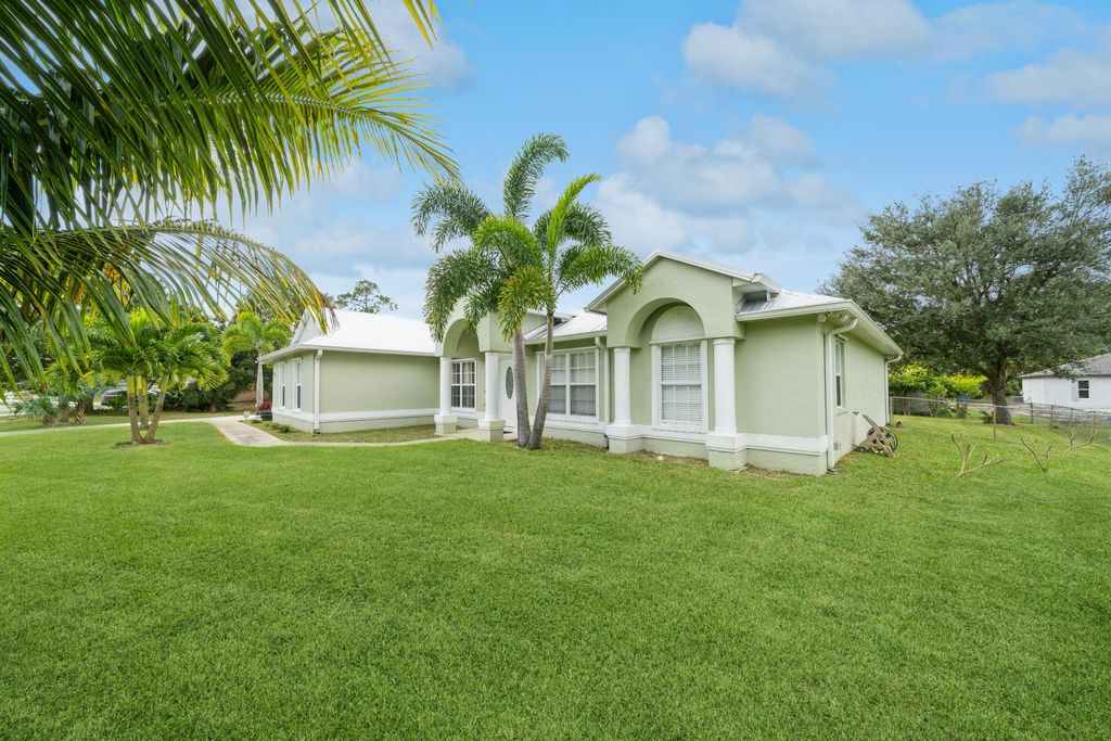 Photo of 1852 SW Erie Street, Port Saint Lucie, FL 34953 (MLS # R10942455)