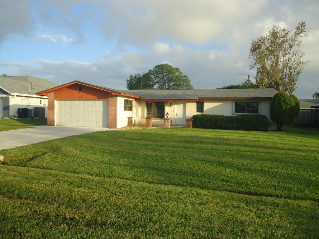 Photo of 1426 SE Griffin Terrace, Port Saint Lucie, FL 34952 (MLS # R11031049)