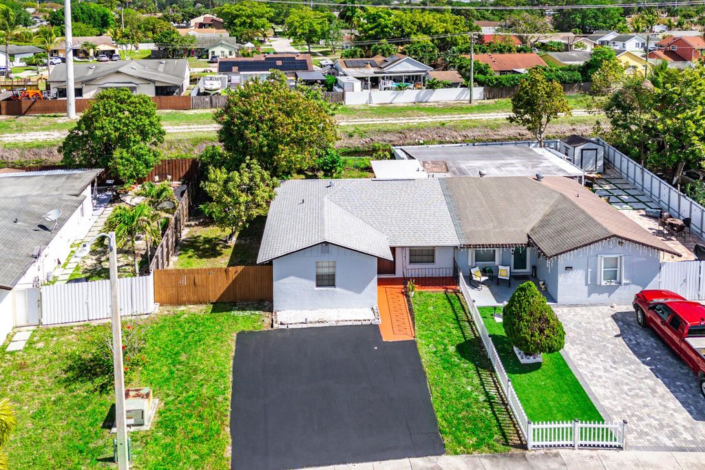 Photo of 5177 Cannon Way, West Palm Beach, FL 33415 (MLS # B26011561)