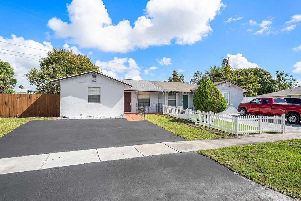 Photo of 5177 Cannon Way, West Palm Beach, FL 33415 (MLS # B26011561)